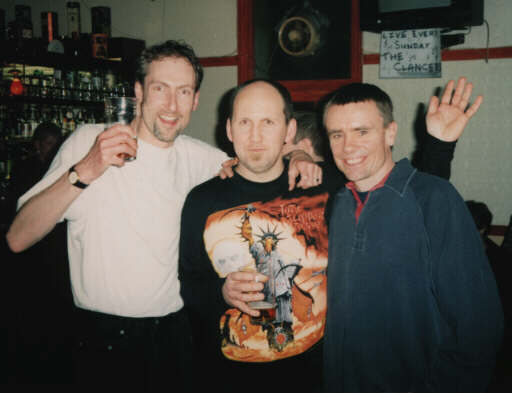 Nick John, Lee Burrows and ex-roadie and friend Alan Bull at a London Praying Mantis Gig